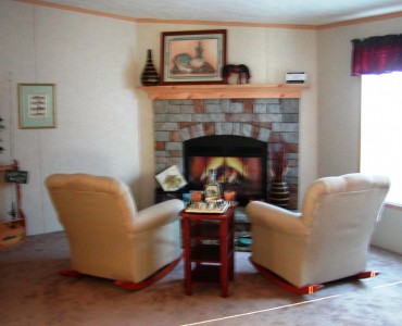 rocking chairs in front of fireplace