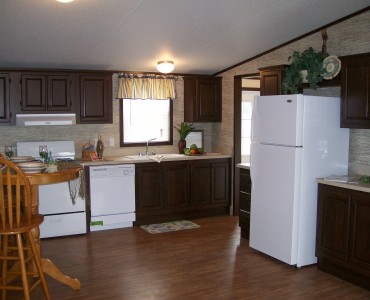 Kitchen with dark cabinetry