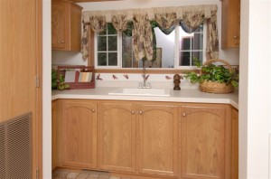 Utility sink with cabinetry